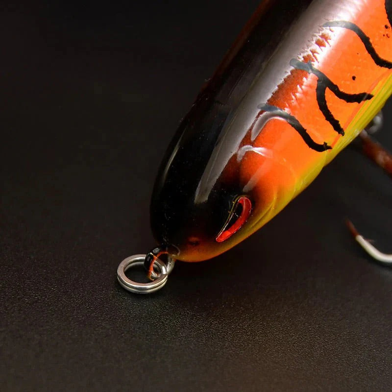 Floating, rotating fish bait in the shape of a propeller