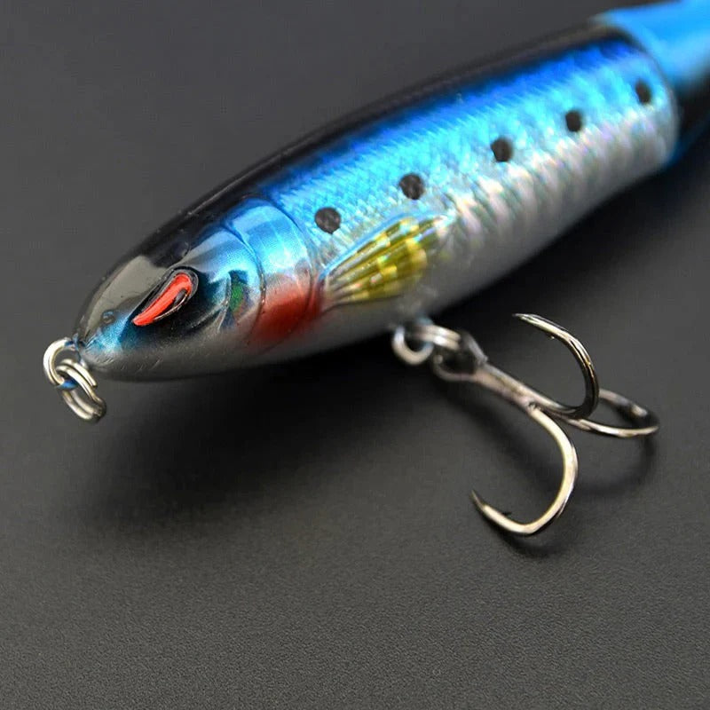 Floating, rotating fish bait in the shape of a propeller