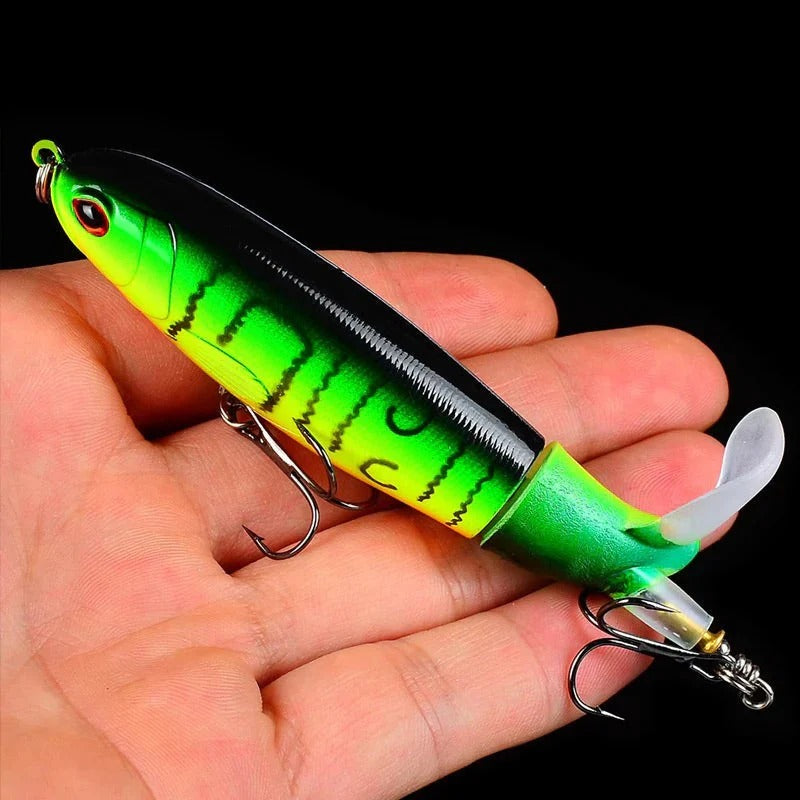 Floating, rotating fish bait in the shape of a propeller