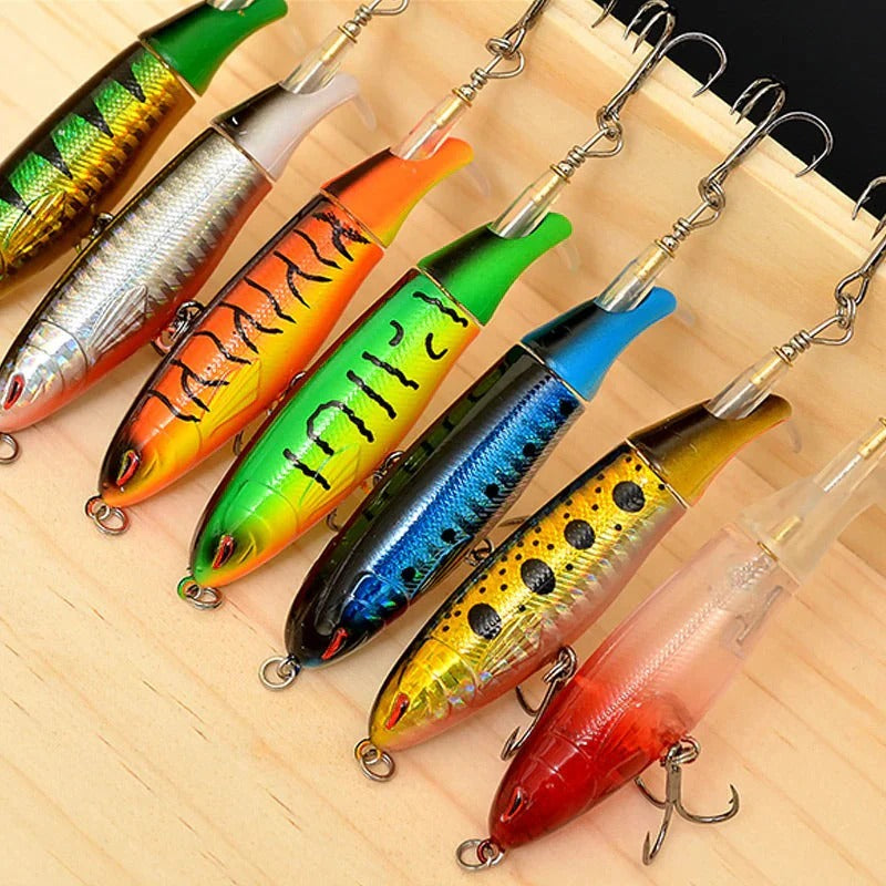 Floating, rotating fish bait in the shape of a propeller