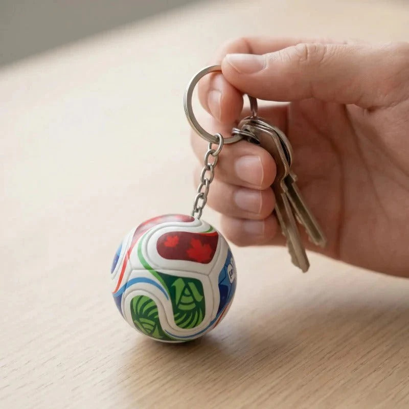 Football keychain with World Cup trophy